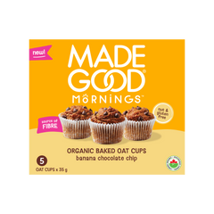 Box of Made Good Mornings Organic Baked Oat Cups, banana chocolate chip flavor. Text highlights nut and gluten free, rich in fiber.