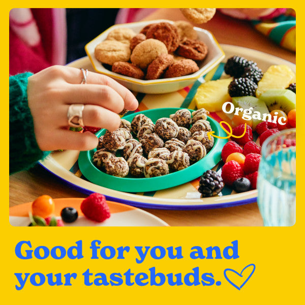 Good for you and your tastebuds: hands reaching for organic snacks